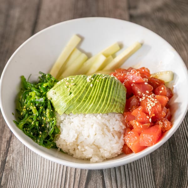 Vinsar's Lounge Asian-fusion poke bowl with tuna, avocado, seaweed salad, and rice.